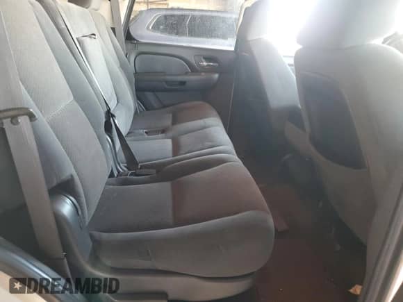 2007 Chevrolet Tahoe LS z VIN 1GNFC13007J380164, wystawiony jako Copart lot #84642765 z przebiegiem Nie podano mil oraz Szkoda całkowita • Salvage title. Historia ofert i sprzedaży dostępna na DreamBid. Obrazek 10.