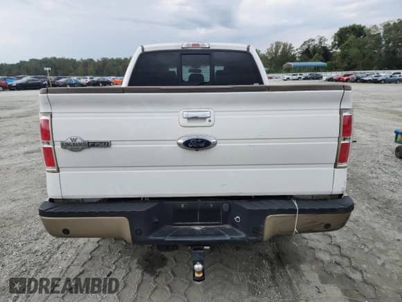 2013 Ford F-150 Lariat с VIN 1FTFW1ETXDKF90154, выставлен на аукционе Copart как лот 80827015 с пробегом 174 701 миль миль и Списание • Salvage title. История ставок и продаж доступна на DreamBid. Изображение 6.