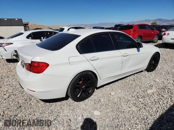 2012 BMW 3 Series 328i with VIN WBA3C1C59CF433798, listed as a Copart auction lot 83958835 with 132,908 mi miles and Salvage title. Bid and sale history available at DreamBid. Image 3.