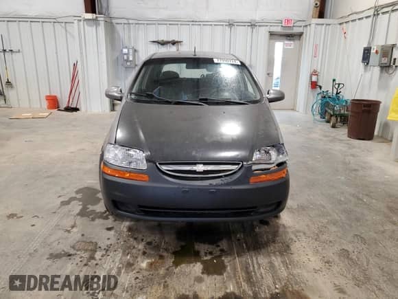 2008 Chevrolet Aveo LS z VIN KL1TD66648B266385, wystawiony jako Copart lot #77990724 z przebiegiem 142 831 mil mil oraz Czysty tytuł • Clean title. Historia ofert i sprzedaży dostępna na DreamBid. Obrazek 5.