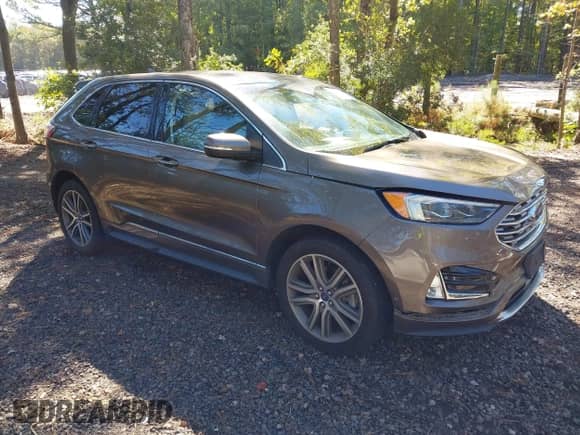 2019 Ford Edge Titanium with VIN 2FMPK4K90KBB34855, listed as a IAAI auction lot 43451017 with 94,796 mi miles and . Bid and sale history available at DreamBid. Image 1.
