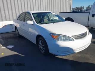 2003 Toyota Camry LE with VIN JTDBE32K730188966, listed as a IAAI auction lot 43482477 with 205,481 mi miles and . Bid and sale history available at DreamBid. Image 1.
