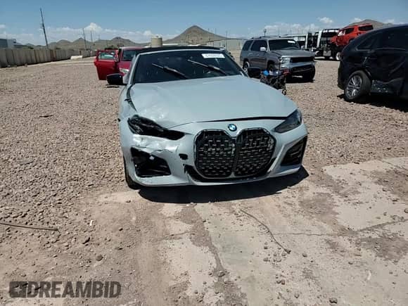 2022 BMW 4 Series 430i with VIN WBA23AT0XNCH93797, listed as a Copart auction lot 67658555 with 52,210 mi miles and Salvage title. Bid and sale history available at DreamBid. Image 13.