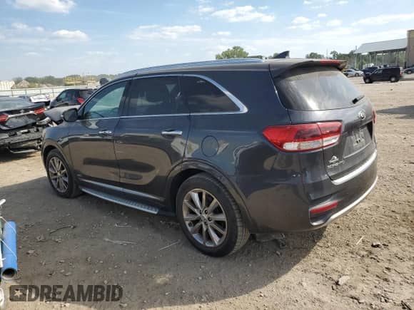2016 Kia Sorento SXL z VIN 5XYPKDA56GG085361, wystawiony jako Copart lot #84956405 z przebiegiem 139 310 mil mil oraz Szkoda całkowita • Salvage title. Historia ofert i sprzedaży dostępna na DreamBid. Obrazek 2.