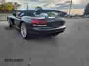 2005 Dodge Viper SRT-10 with VIN 1B3JZ65Z95V500299, listed as a Copart auction lot 84073595 with 34,364 mi miles and Clean title. Bid and sale history available at DreamBid. Image 4.