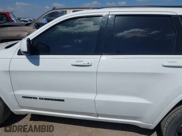 2021 Jeep Grand Cherokee Laredo X with VIN 1C4RJFAGXMC809948, listed as a IAAI auction lot 42806650 with 71,623 mi miles and . Bid and sale history available at DreamBid. Image 14.