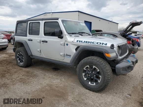 2024 Jeep Wrangler Rubicon z VIN 1C4RJXR69RW255776, wystawiony jako Copart lot #81444315 z przebiegiem 11 461 mil mil oraz Szkoda całkowita • Salvage title. Historia ofert i sprzedaży dostępna na DreamBid. Obrazek 4.