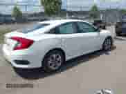 2016 Honda Civic LX with VIN 19XFC2F56GE055599, listed as a IAAI auction lot 42959295 with 145,680 mi miles and . Bid and sale history available at DreamBid. Image 4.