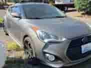 2013 Hyundai Veloster Turbo с VIN KMHTC6AE3DU097576, выставлен на аукционе Copart как лот 82102005 с пробегом 140 467 миль миль и Чистый • Clean title. История ставок и продаж доступна на DreamBid. Изображение 1.