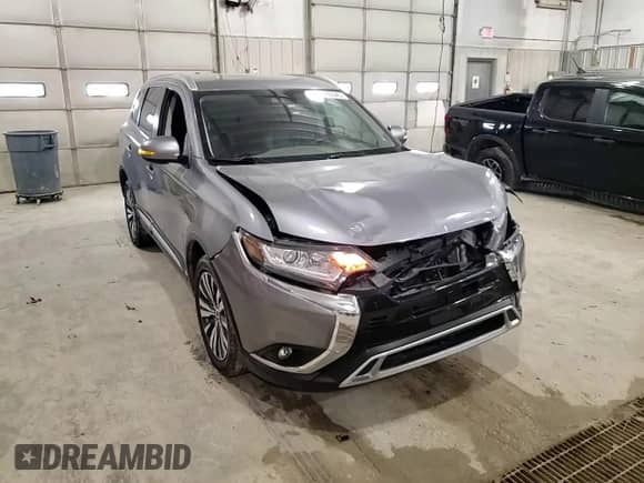 2020 Mitsubishi Outlander SE с VIN JA4AD3A34LJ001339, выставлен на аукционе Copart как лот 50270345 с пробегом 117 043 миль миль и Списание • Salvage title. История ставок и продаж доступна на DreamBid. Изображение 12.