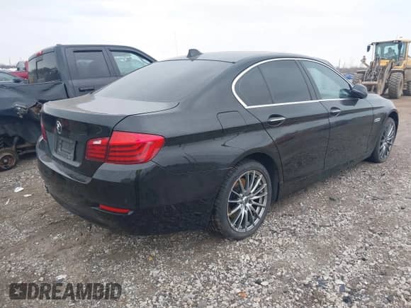 2014 BMW 5 Series 535d with VIN WBAXA5C51ED691018, listed as a IAAI auction lot 41887112 with 174,684 mi miles and . Bid and sale history available at DreamBid. Image 4.