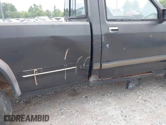 1987 Dodge Dakota with VIN 1B7GR14M2HS417062, listed as a IAAI auction lot 43035917 with 189,633 mi miles and . Bid and sale history available at DreamBid. Image 6.