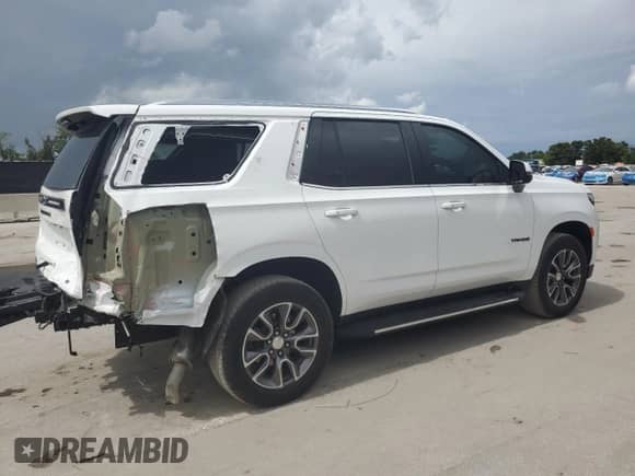 2023 Chevrolet Tahoe LT с VIN 1GNSKNKT0PR552814, выставлен на аукционе Copart как лот 62985055 с пробегом 20 457 миль миль и Списание • Salvage title. История ставок и продаж доступна на DreamBid. Изображение 3.