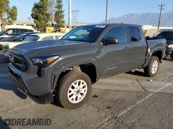 2025 Toyota Tacoma SR5 with VIN 3TMKB5FNXSM034398, listed as a Copart auction lot 69094555 with 5,009 mi miles and Salvage title. Bid and sale history available at DreamBid. Image 1.