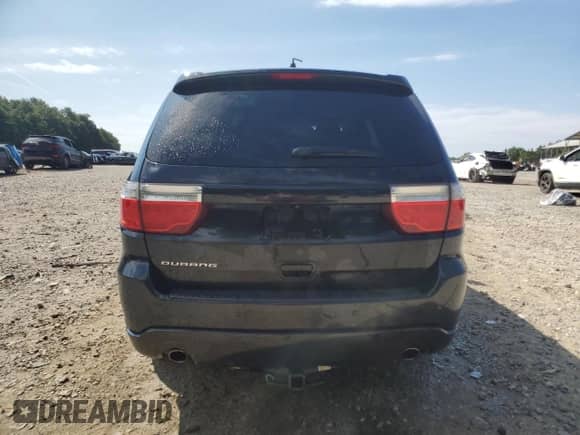 2013 Dodge Durango SXT with VIN 1C4RDHAG4DC662092, listed as a Copart auction lot 71425135 with 169,603 mi miles and Salvage title. Bid and sale history available at DreamBid. Image 6.