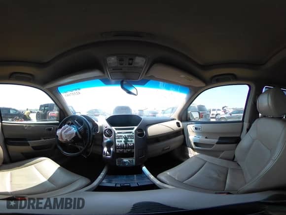 2009 Honda Pilot Touring with VIN 5FNYF38809B004142, listed as a IAAI auction lot 42337103 with 152,874 mi miles and . Bid and sale history available at DreamBid. Image 18.