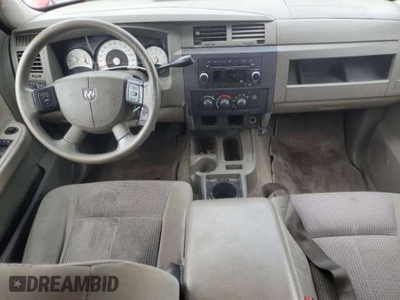 2010 Dodge Dakota Bighorn/Lonestar z VIN 1D7CE3GK7AS130683, wystawiony jako Copart lot #51154725 z przebiegiem 111 283 mil mil oraz Szkoda całkowita • Salvage title. Historia ofert i sprzedaży dostępna na DreamBid. Obrazek 8.