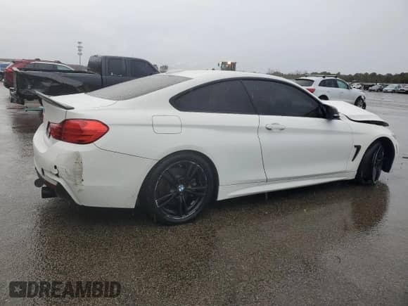 2017 BMW 4 Series 440i with VIN WBA4P1C59HK522441, listed as a Copart auction lot 84673044 with Not provided miles and Salvage title. Bid and sale history available at DreamBid. Image 3.