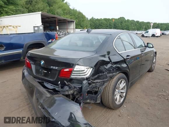 2014 BMW 5 Series 528i xDrive with VIN WBA5A7C50ED615857, listed as a IAAI auction lot 42926355 with 131,175 mi miles and . Bid and sale history available at DreamBid. Image 4.