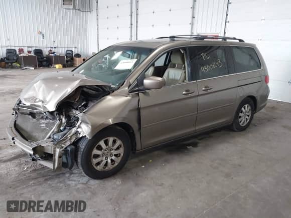 2008 Honda Odyssey EX-L with VIN 5FNRL38658B402974, listed as a IAAI auction lot 43008013 with 220,738 mi miles and . Bid and sale history available at DreamBid. Image 18.