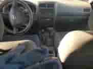 2002 Nissan Frontier SVE with VIN 1N6MD27Y22C389865, listed as a Copart auction lot 89300285 with 196,212 mi miles and Salvage title. Bid and sale history available at DreamBid. Image 8.