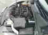 2014 Ford Focus Titanium z VIN 1FADP3N23EL402874, wystawiony jako IAAI lot #43397973 z przebiegiem 153 283 mil mil oraz . Historia ofert i sprzedaży dostępna na DreamBid. Obrazek 19.