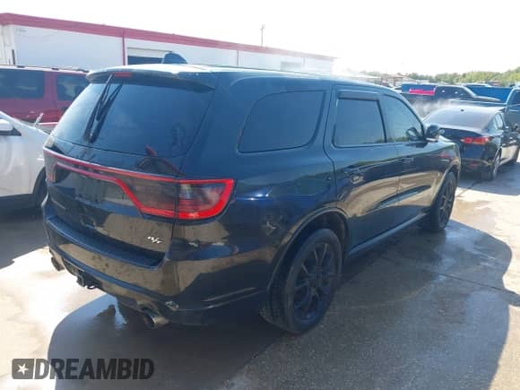 2015 Dodge Durango R/T with VIN 1C4SDHCTXFC147371, listed as a IAAI auction lot 43389347 with 172,490 mi miles and . Bid and sale history available at DreamBid. Image 4.