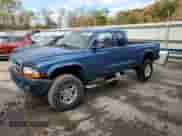 2004 Dodge Dakota Sport with VIN 1D7HG32N04S552610, listed as a Copart auction lot 75866434 with 157,090 mi miles and Salvage title. Bid and sale history available at DreamBid. Image 1.