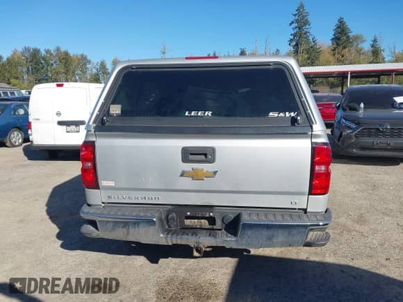 2016 Chevrolet Silverado 1500 LT with VIN 1GCVKREC8GZ229426, listed as a IAAI auction lot 43449954 with 104,294 mi miles and . Bid and sale history available at DreamBid. Image 17.