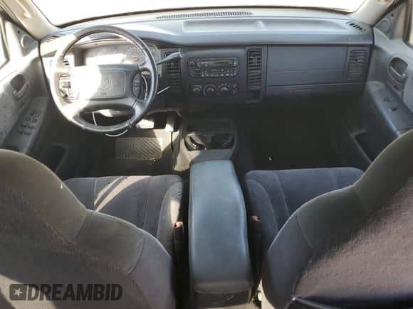 2003 Dodge Dakota Sport z VIN 1D7HL38N03S172331, wystawiony jako Copart lot #78851764 z przebiegiem 162 521 mil mil oraz Czysty tytuł • Clean title. Historia ofert i sprzedaży dostępna na DreamBid. Obrazek 8.