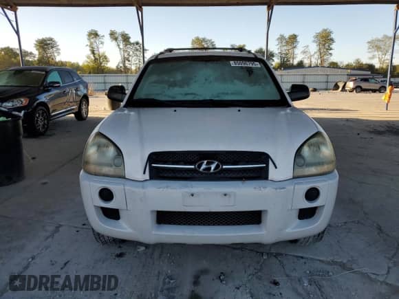 2006 Hyundai Tucson GL z VIN KM8JM12B76U462890, wystawiony jako Copart lot #85090795 z przebiegiem 139 274 mil mil oraz Szkoda całkowita • Salvage title. Historia ofert i sprzedaży dostępna na DreamBid. Obrazek 5.