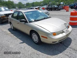2001 Saturn SL with VIN 1G8ZK54721Z272773, listed as a IAAI auction lot 42449133 with 56,714 mi miles and . Bid and sale history available at DreamBid. Image 1.