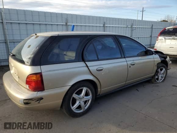1997 Saturn SW with VIN 1G8ZK8276VZ295659, listed as a Copart auction lot 47964235 with 122,219 mi miles and Salvage title. Bid and sale history available at DreamBid. Image 3.