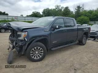 2019 GMC Sierra 1500 AT4 with VIN 1GTP9EED6KZ365682, listed as a Copart auction lot 61931675 with 107,144 mi miles and Salvage title. Bid and sale history available at DreamBid. Image 1.