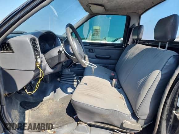 1996 Nissan Frontier XE with VIN 1N6SD11S7TC365939, listed as a Copart auction lot 70723465 with 88,414 mi miles and Salvage title. Bid and sale history available at DreamBid. Image 7.