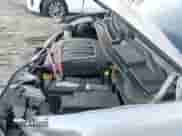 2014 Dodge Grand Caravan SE with VIN 2C4RDGBG4ER463299, listed as a IAAI auction lot 41386011 with 173,210 mi miles and . Bid and sale history available at DreamBid. Image 13.