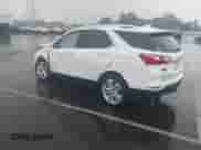 2020 Chevrolet Equinox Premier with VIN 3GNAXPEX4LS621292, listed as a IAAI auction lot 43267834 with 75,809 mi miles and . Bid and sale history available at DreamBid. Image 3.