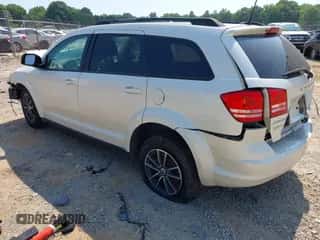 2018 Dodge Journey SE with VIN 3C4PDCABXJT448934, listed as a IAAI auction lot 42614601 with Not provided miles and . Bid and sale history available at DreamBid. Image 3.