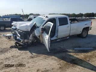 2018 Chevrolet Silverado 3500HD Work Truck с VIN 1GC4KZCG8JF218517, выставлен на аукционе Copart как лот 74915614 с пробегом 148 040 миль миль и Списание • Salvage title. История ставок и продаж доступна на DreamBid. Изображение 1.