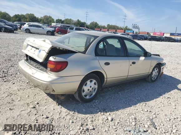 2002 Saturn SL с VIN 1G8ZH528X2Z115228, выставлен на аукционе Copart как лот 71235424 с пробегом 64 375 миль миль и Списание • Salvage title. История ставок и продаж доступна на DreamBid. Изображение 3.