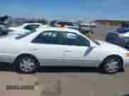 1997 Toyota Camry LE z VIN JT2BF22K6V0052184, wystawiony jako IAAI lot #42608245 z przebiegiem 188 191 mil mil oraz . Historia ofert i sprzedaży dostępna na DreamBid. Obrazek 13.