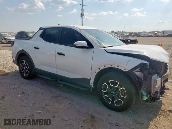 2022 Hyundai Santa Cruz SEL с VIN 5NTJBDAE4NH026922, выставлен на аукционе Copart как лот 71542595 с пробегом 64 254 миль миль и Списание • Salvage title. История ставок и продаж доступна на DreamBid. Изображение 4.