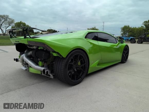 2015 Lamborghini Huracan с VIN ZHWUC1ZF7FLA03405, выставлен на аукционе Copart как лот 57724465 с пробегом 31 953 миль миль и Чистый • Clean title. История ставок и продаж доступна на DreamBid. Изображение 4.
