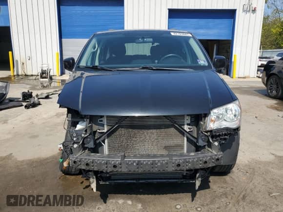 2016 Dodge Grand Caravan SXT with VIN 2C4RDGCGXGR339846, listed as a Copart auction lot 82103665 with 131,716 mi miles and Salvage title. Bid and sale history available at DreamBid. Image 5.
