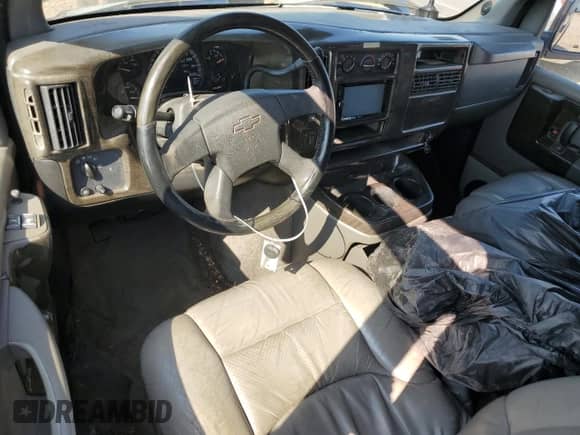 2004 Chevrolet Express Passenger with VIN 1GBFG15T841139909, listed as a Copart auction lot 67942615 with 179,684 mi miles and Salvage title. Bid and sale history available at DreamBid. Image 8.