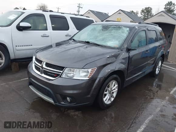 2015 Dodge Journey SXT with VIN 3C4PDCBB7FT735721, listed as a IAAI auction lot 41775824 with 113,446 mi miles and . Bid and sale history available at DreamBid. Image 2.