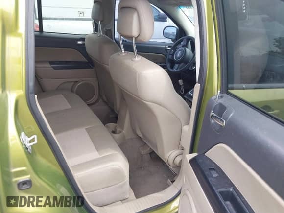 2012 Jeep Compass Sport z VIN 1C4NJDBB8CD577395, wystawiony jako IAAI lot #42768124 z przebiegiem 127 518 mil mil oraz . Historia ofert i sprzedaży dostępna na DreamBid. Obrazek 8.