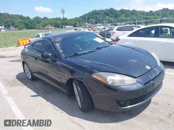 2007 Hyundai Tiburon GT с VIN KMHHN66F17U261929, выставлен на аукционе IAAI как лот 42679006 с пробегом 100 213 миль миль и . История ставок и продаж доступна на DreamBid. Изображение 13.