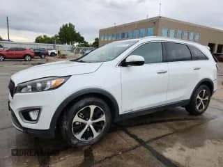2018 Kia Sorento EX with VIN 5XYPHDA55JG349580, listed as a Copart auction lot 80155125 with 124,546 mi miles and Salvage title. Bid and sale history available at DreamBid. Image 1.