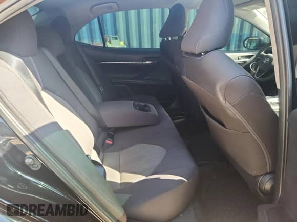 2023 Toyota Camry LE z VIN 4T1R11AK7PU774707, wystawiony jako Copart lot #84275165 z przebiegiem 42 170 mil mil oraz Szkoda całkowita • Salvage title. Historia ofert i sprzedaży dostępna na DreamBid. Obrazek 10.